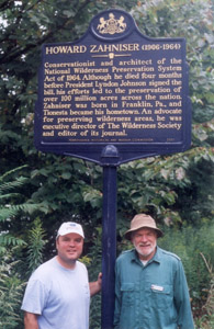 Zahniser's son Matt and grandson David in front of Zahniser historical marker